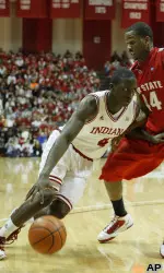Guard Victor Oladipo drives to the hoop with Ohio State guard William Buford defending.