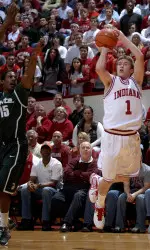 Jordan Hulls takes a first half shot against Michigan State