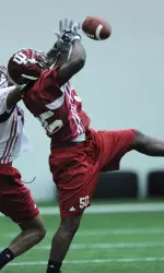 Cornerback Lawrence Barnett breaks up a pass during the first week of spring practice.