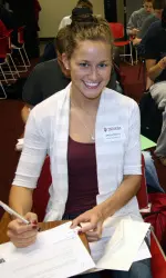 Senior Kayla Smith (track and field) writes letters to Varsity Club donors at the annual Thank-a-thon on Thursday, April 8, 2010.