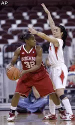 Indiana's Jori Davis, left, looks for an open pass as Ohio State's Samantha Prahalis defends during the second half. (AP Photo/Jay LaPrete)