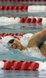 Titus Knight had key victories for Indiana in the 100 and 200 freestyle in a victory over Michigan.