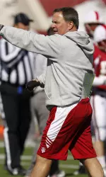 Head coach Kevin Wilson looks on as the Hoosiers scrimmaged for the first time this spring.