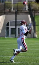 Sophomore Duwyce Wilson hauls in a pass at Tuesday's practice.