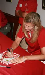 IU head volleyball coach Sherry Dunbar signed autographs for fans in Lafayette.