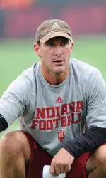 Co-defensive coordinator Mike Ekeler works with his linebackers.