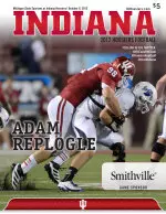 Adam Replogle is featured on this week's game program cover.