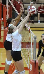 Seniors Samantha Thrower and Kelci Marschall capped IU's big win with a block for match point.