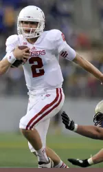 Cameron Coffman completed 25-of-37 passes for 244 yards.