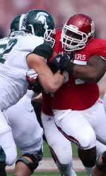 Larry Black, Jr. is featured on this week's game program cover.