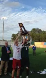 Captains Caleb Konstanski and Luis Soffner with the NCAA Championship trophy.