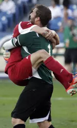 Patrick Doody and Luis Soffner celebrate IU's eighth title.