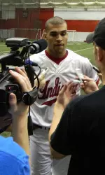 Micah Johnson speaks with several assembled media members