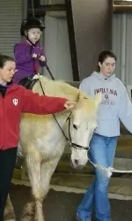 IU Volleyball's Jordan Haverly with PALS rider Allison.