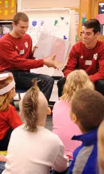 Eriq Zavaleta and A.J. Corrado read to the kids at Arlington Elementary as part of Read Across America day.