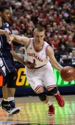 Jordan Hulls drives against Penn State guard Jermaine Marshall.