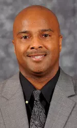 Associate head coach Chris Day, along with his wife Megan, balance his busy schedule as a Division I coach with raising four children.