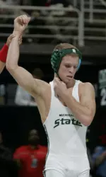 Associate head coach Nick Simmons back in his days as a Spartan student-athlete