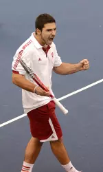 Freshman Sam Monette scored big wins in doubles and singles for the Hoosiers.