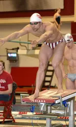 Junior Cody Miller won three individual events in a dual meet victory at Louisville Friday night.