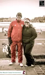 Head Coach Clint Wallman and assistant coach Lauren Harling prepare for round one of the Briar's Creek Invitational.