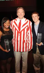 Indiana University Vice President and Director of Athletics Fred Glass with the Director's Award winners Ciersten Burks and Jordan Hulls at the conclusion of the Spirit of Indiana Showcase.