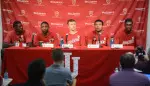 Five players talking to the media
