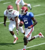 Linebacker Flo Hardin chases down Tre Roberson at Friday's scrimmage.