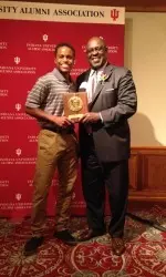 Yogi Ferrell presents Quinn Buckner with the Clevenger Award