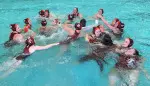 Celebrating after defeating Michigan to win CWPA Championship
