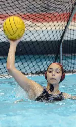 Goalkeeper Jessica Gaudreault looks to make a pass.