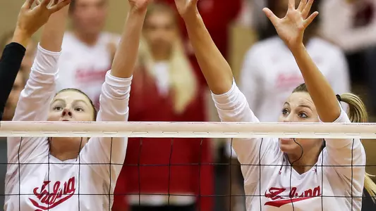 BLOOMINGTON, IN - OCTOBER 21, 2018 - Middle blocker Lexi Johnson #13 of the Indiana Hoosiers and Middle blocker Hayden Huybers #2 of the Indiana Hoosiers during the game against the Maryland Terrapins and the Indiana Hoosiers at University Gym in Bloomington, IN. Photo By Missy Minear/Indiana Athletics