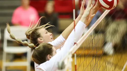 BLOOMINGTON, IN - OCTOBER 19, 2018 - Middle blocker Hayden Huybers #2 of the Indiana Hoosiers and Outside hitter Breana Edwards #11 of the Indiana Hoosiers during the game between the Ohio State Buckeyes and the Indiana Hoosiers at the University Gym in Bloomington, IN. Photo By Amelia Herrick/Indiana Athletics