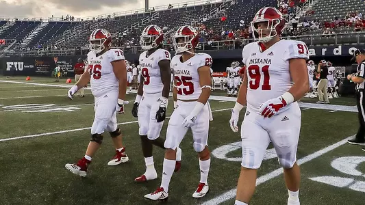 MIAMI, FL - SEPTEMBER 01, 2018 - offensive lineman Wes Martin #76 of the Indiana Hoosiers, defensive back Jonathan Crawford #9 of the Indiana Hoosiers, wide receiver Luke Timian #25 of the Indiana Hoosiers and defensive lineman Jacob Robinson #91 of the Indiana Hoosiers during the game against the FIU Panthers and the Indiana Hoosiers at Riccardo Silva Stadium in Miami, FL. Photo By Craig Bisacre/Indiana Athletics