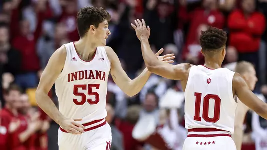 BLOOMINGTON, IN - NOVEMBER 14, 2018 - Forward Evan Fitzner #55 of the Indiana Hoosiers and Guard Robert Phinisee #10 of the Indiana Hoosiers during the game against the Marquette Golden Eagles and the Indiana Hoosiers at Simon Skjodt Assembly Hall in Bloomington, IN. Photo By Craig Bisacre/Indiana Athletics