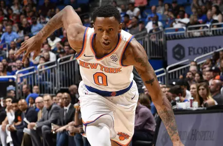 ORLANDO, FL - FEBRUARY 22: Troy Williams #0 of the New York Knicks handles the ball against the Orlando Magic on February 22, 2018 at Amway Center in Orlando, Florida. NOTE TO USER: User expressly acknowledges and agrees that, by downloading and or using this photograph, User is consenting to the terms and conditions of the Getty Images License Agreement. Mandatory Copyright Notice: Copyright 2018 NBAE (Photo by Fernando Medina/NBAE via Getty Images)