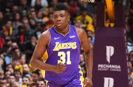 LOS ANGELES, CA - DECEMBER 23: Thomas Bryant #31 of the Los Angeles Lakers runs on the court during the game against the Portland Trail Blazers on December 23, 2017 at STAPLES Center in Los Angeles, California. NOTE TO USER: User expressly acknowledges and agrees that, by downloading and/or using this Photograph, user is consenting to the terms and conditions of the Getty Images License Agreement. Mandatory Copyright Notice: Copyright 2017 NBAE (Photo by Andrew D. Bernstein/NBAE via Getty Images)
