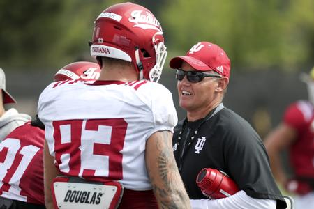 BLOOMINGTON, IN - AUGUST 10, 2018 - Indiana Hoosiers Head Coach Tom Allen and tight end Austin Dorris #83 of the Indiana Hoosiers during Fall camp practice on the football practice field in Bloomington, IN. Photo By 