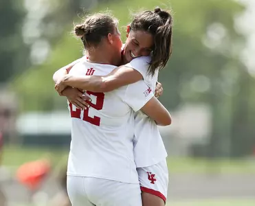 BLOOMINGTON, IN - AUGUST 19, 2018 - Forward Annelie Leitner #22 of the Indiana Hoosiers and Midfielder Allison Jorden #14 of the Indiana Hoosiers celebrate during the game against the Miami University RedHawks and the Indiana Hoosiers at Bill Armstrong Stadium in Bloomington, IN. Photo By Carter Waldron/Indiana Athletics