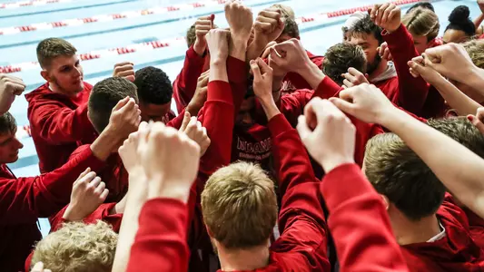 Men's Swimming Team Huddle