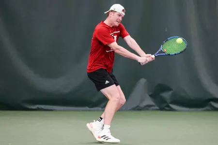 BLOOMINGTON, IN - April 17, 2022 - Patrick Fletchall during the match between the Nebraska Cornhuskers and the Indiana Hoosiers at IU Tennis Center in Bloomington, IN. Photo By Gretta Cohoon/Indiana Athletics