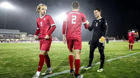 BLOOMINGTON, IN - November 27, 2022 - defender Joey Maher #2. midfielder Samuel Sarver #9, and goalkeeper Jt Harms #0 of the Indiana Hoosiers during the game between the Marshall Herd and the Indiana Hoosiers at Bill Armstrong Stadium in Bloomington, IN. Photo By Chris Conaway/Indiana University