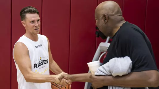 Jordan Hulls and Mike Woodson