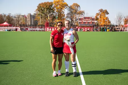BLOOMINGTON, IN - October 23, 2022 - midfield/forward Kennedy Reardon #16 of the Indiana Hoosiers and Head Coach Kayla Bashore of the Indiana Hoosiers during the game between the Ohio University Bobcats and the Indiana Hoosiers at IU Field Hockey Complex in Bloomington, IN. Photo By Gracie Farrall\Indiana Athletics