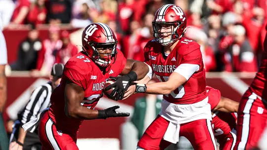 BLOOMINGTON, IN - November 18, 2023 - running back Trent Howland #27 of the Indiana Hoosiers and quarterback Brendan Sorsby # 15 of the Indiana Hoosiers during the game between the Michigan State Spartans and the Indiana Hoosiers at Memorial Stadium in Bloomington, IN. Photo By Gretta Cohoon/Indiana Athletics