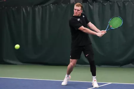 BLOOMINGTON, IN - JANUARY 29, 2023 - Patrick Fletchall during the match between the Butler Bulldogs and the Indiana Hoosiers at Indiana University Tennis Center in Bloomington, IN. Photo By Pearson Georges/Indiana Athletics