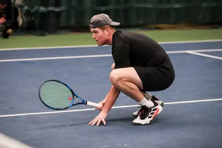 BLOOMINGTON, IN - FEBRUARY 17, 2023 -  Patrick Fletchall during the match between the Louisville Cardinals and the Indiana Hoosiers at the IU Tennis Center in Bloomington, IN. Photo By Xavier Daniels/Indiana Athletics