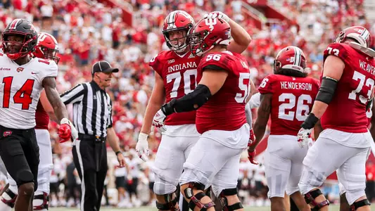 BLOOMINGTON, IN - September 17, 2022 - offensive lineman Luke Haggard #70 of the Indiana Hoosiers and offensive lineman Mike Katic #56 of the Indiana Hoosiers during the game between the Western Kentucky Hill Toppers and the Indiana Hoosiers at Memorial Stadium in Bloomington, IN. Photo By Gracie Farrall\Indiana Athletics