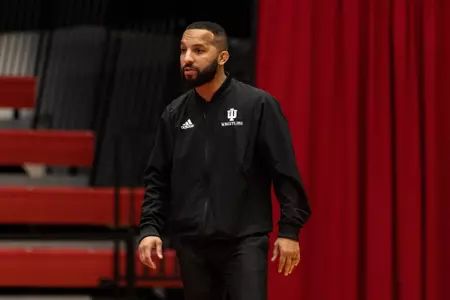BLOOMINGTON, IN - February 05, 2023 - Head Coach Angel Escobedo during the meet between the Penn State Nittany Lions and the Indiana Hoosiers at Wilkinson Hall in Bloomington, IN. Photo By Dalton Wainscott/Indiana Athletics