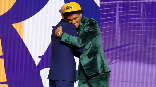 Jalen Hood-Schifino with NBA Commissioner Adam Silver